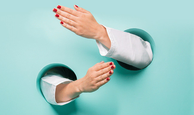 Print design advert showing hands poking through holes